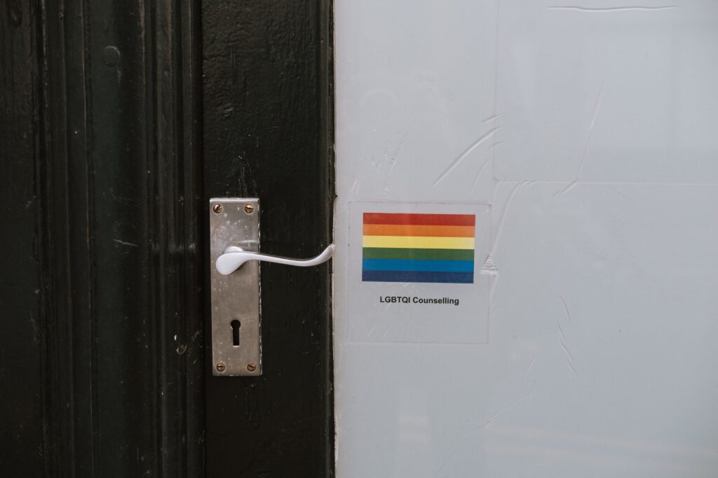 Black door with lgbtqia flag