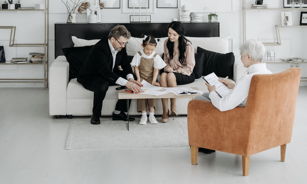 parents and kid in therapy